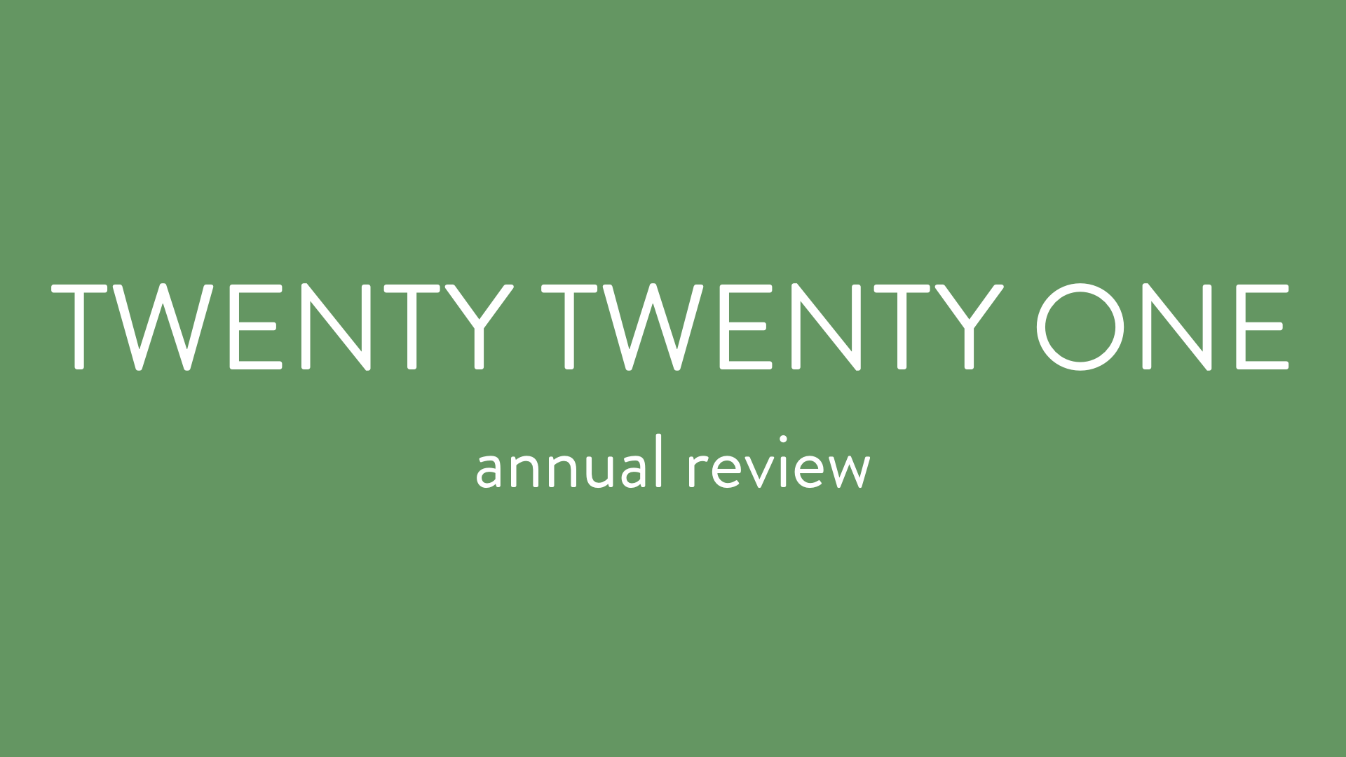 light green background, with the words 'twenty twenty one annual review' on top